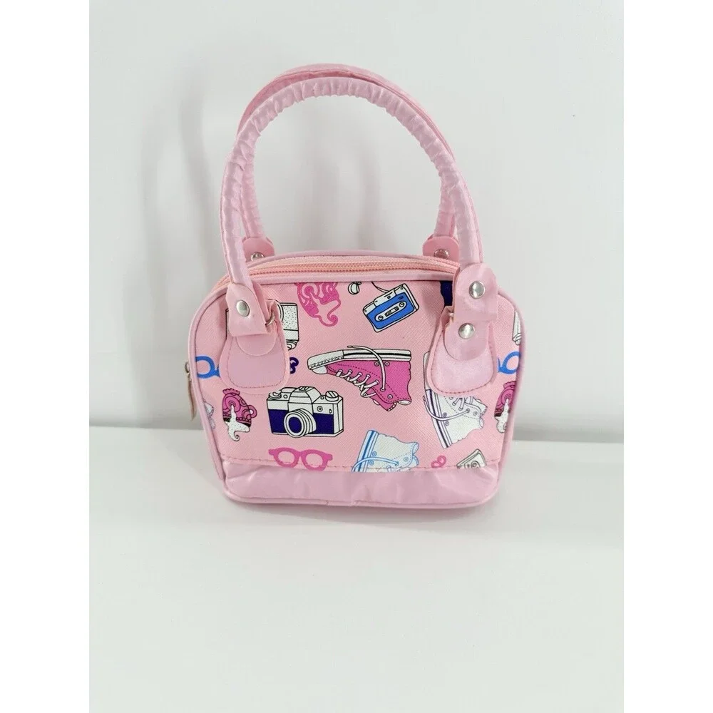 HCC Small/Mini Handbag pink with a print of sneakers, cameras, & cassette tapes